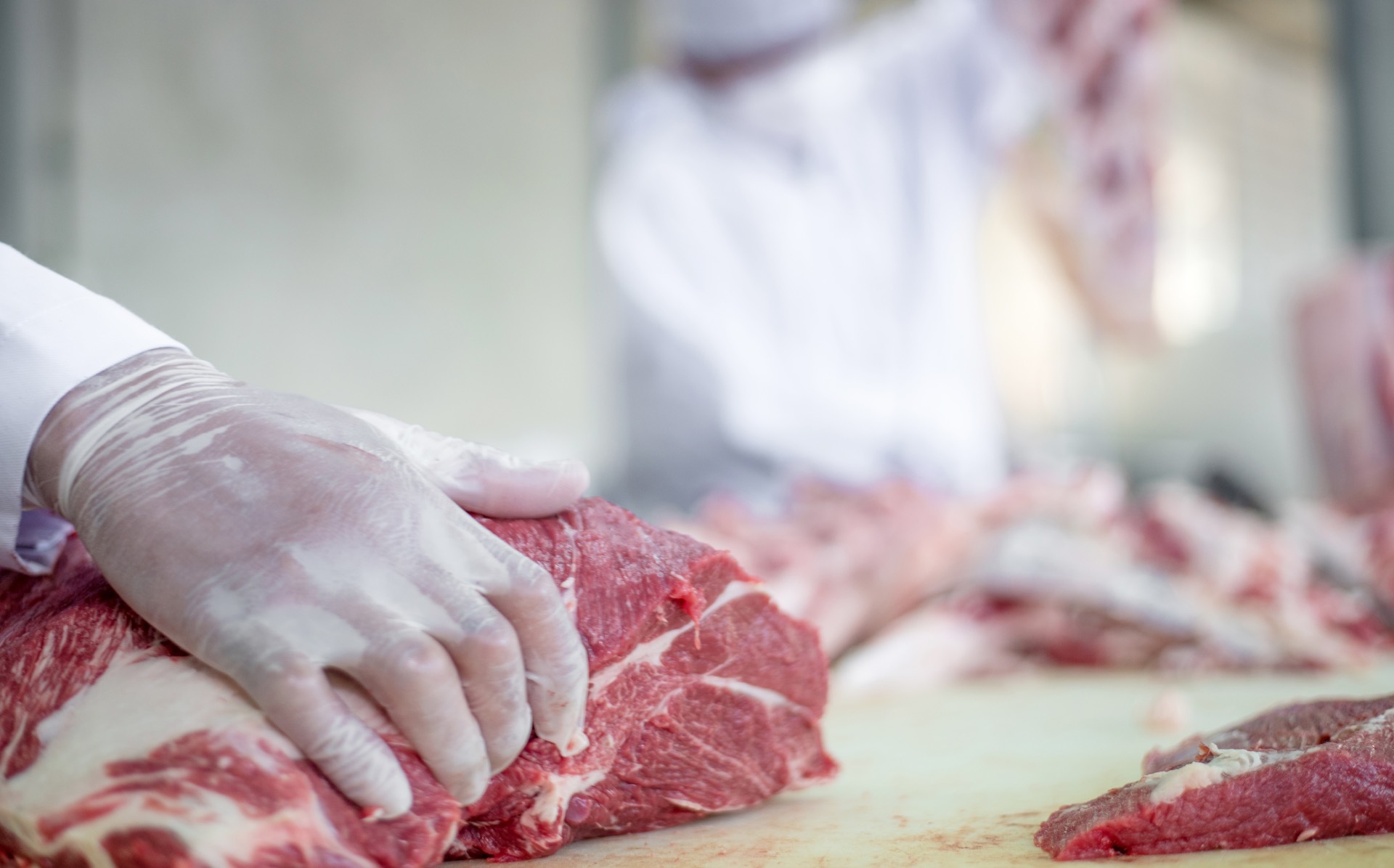 Butcher preparing meat